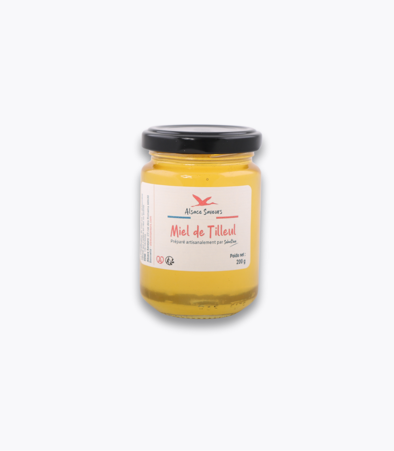 pot de miel de tilleul sur fond gris