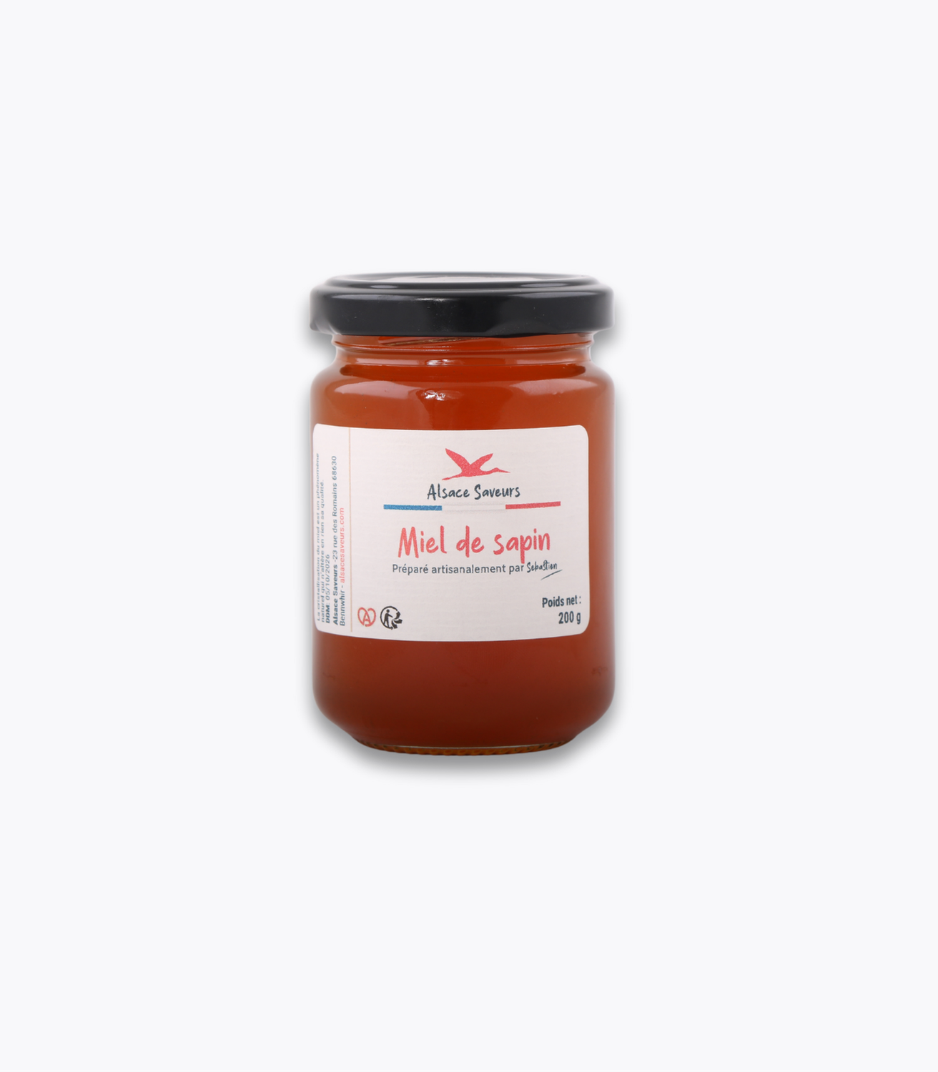 pot de miel de sapin sur fond gris